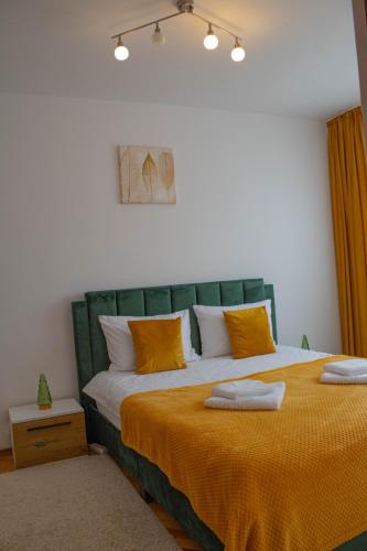 Postel nebo postele na pokoji v ubytování Apartament Aleea Minerva