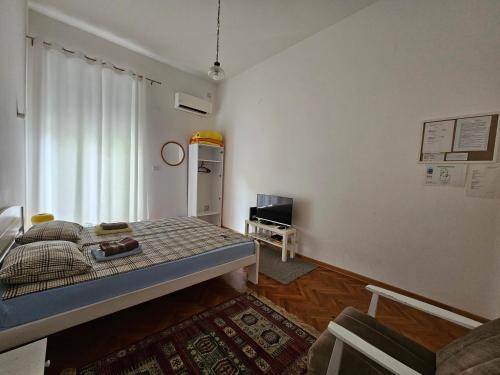 Postel nebo postele na pokoji v ubytování Cricket Park Hostel