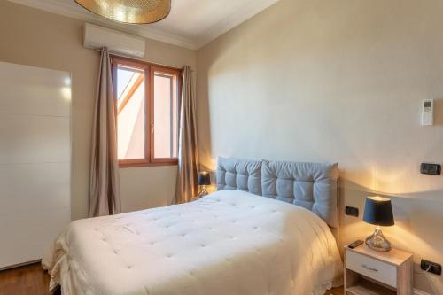 Postel nebo postele na pokoji v ubytování Casa Fiorita