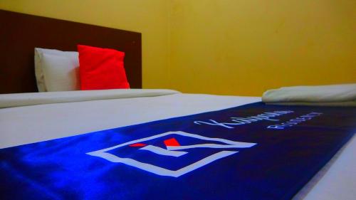 Cama o camas de una habitación en Kalpana Residency