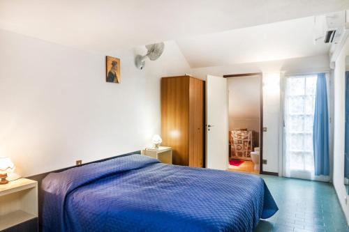 Ένα ή περισσότερα κρεβάτια σε δωμάτιο στο Villetta Indipendente Castiglione