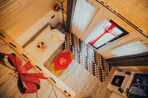 Postel nebo postele na pokoji v ubytování Pensiunea Casa Iulia A-Frame