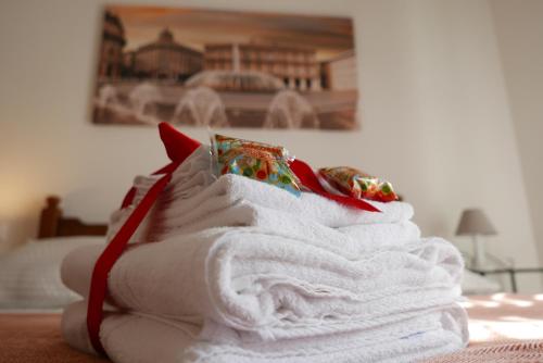 Postel nebo postele na pokoji v ubytování B&B Ai Tre Archi