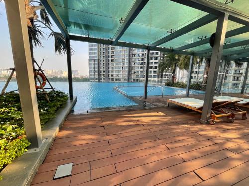 a view of a swimming pool from a building at LANDMARK 81 Condotel Garden Bay in Ho Chi Minh City
