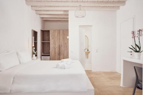 Letto o letti in una camera di Villa Petrolefko By Ethos Hospitality