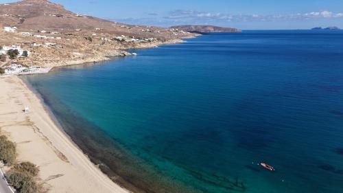 an aerial view of a beach and the ocean at Blue Eye Grand Villa Mykonos in Kalafatis