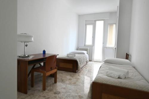 Ένα ή περισσότερα κρεβάτια σε δωμάτιο στο 50mt dai Sassi di Matera - In pieno centro