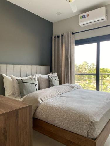 Ένα ή περισσότερα κρεβάτια σε δωμάτιο στο Cozy 2 bedroom app- Aquaview