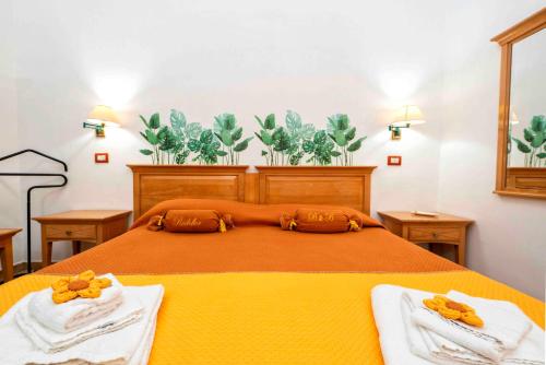 Katil atau katil-katil dalam bilik di Rodoflor Rooms
