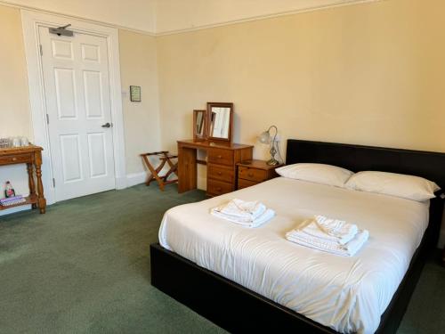 Katil atau katil-katil dalam bilik di Môr Wyn Guest House