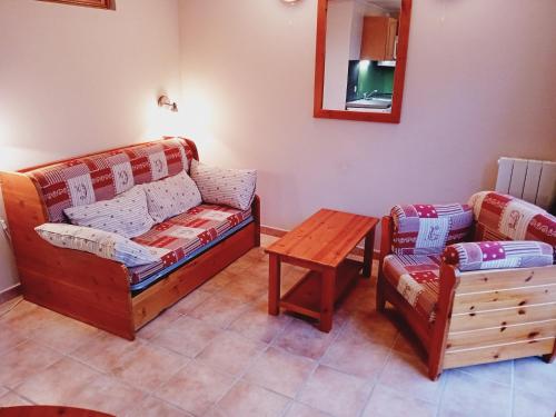 Giường trong phòng chung tại Terrasses D 301 PARC NAT VANOISE appart 4 pers