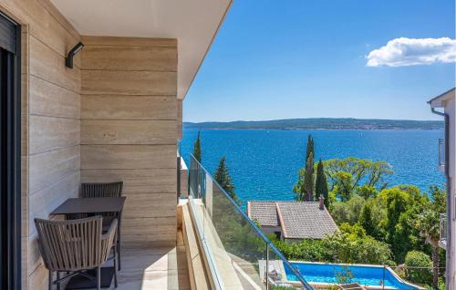 a balcony with a view of the water at Lovely Apartment In Crikvenica in Crikvenica
