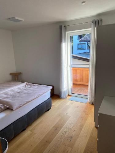 Postel nebo postele na pokoji v ubytování Haus Kaiserblick Top 2