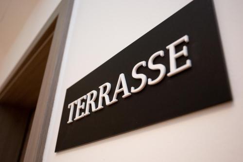 a sign on the side of a building with the word temasi at Lieblingsquartier Sankt Andreasberg Studio 9 in Sankt Andreasberg