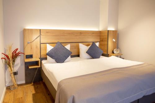 Ένα ή περισσότερα κρεβάτια σε δωμάτιο στο Chalet Bergzeit Studio 2