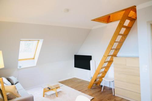 TV a/nebo společenská místnost v ubytování Apartments Meerzeit C