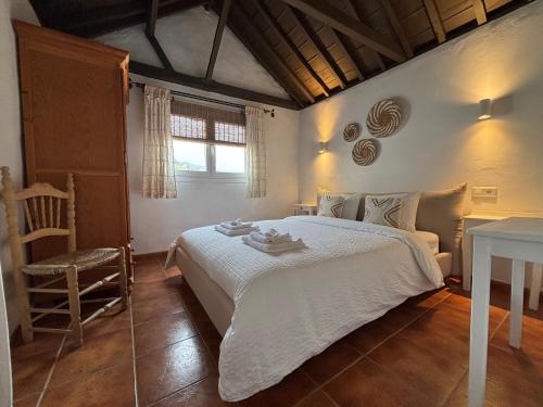 Postel nebo postele na pokoji v ubytování Casa Alta B&B