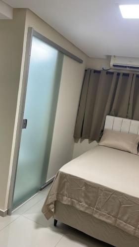 Postel nebo postele na pokoji v ubytování Studio Pé na Areia