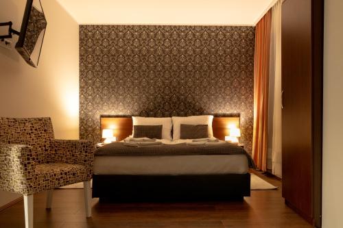 Cama o camas de una habitación en Fenix Apartments
