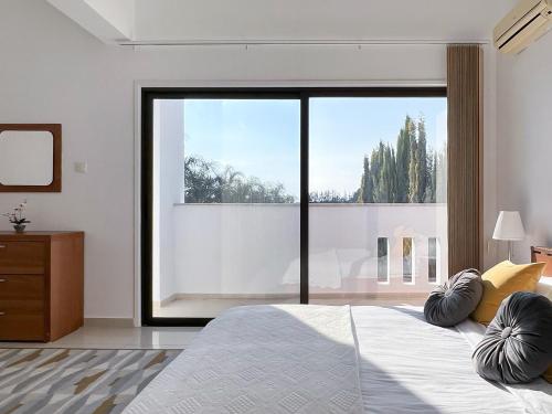 Llit o llits en una habitació de Villa Aris