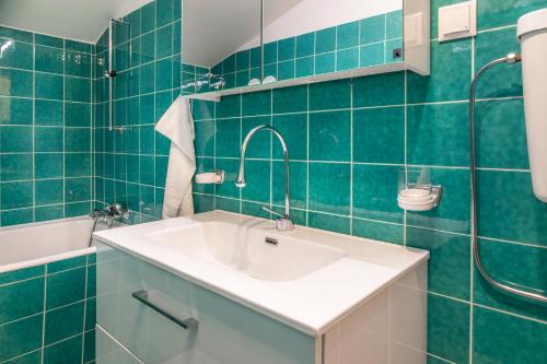Koupelna v ubytování Stadtbauernhof Salzburg - Ferienwohnung - Gut Unterleithen