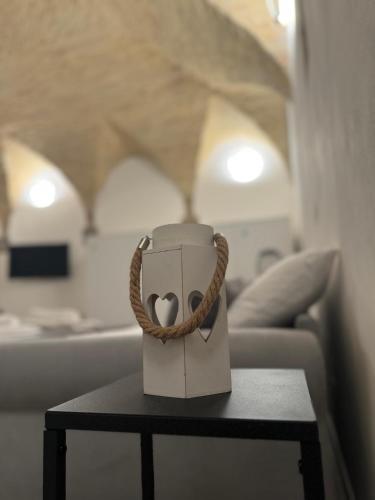 a box with a heart on it sitting on a table at Residenze Le Lunette in Lucera