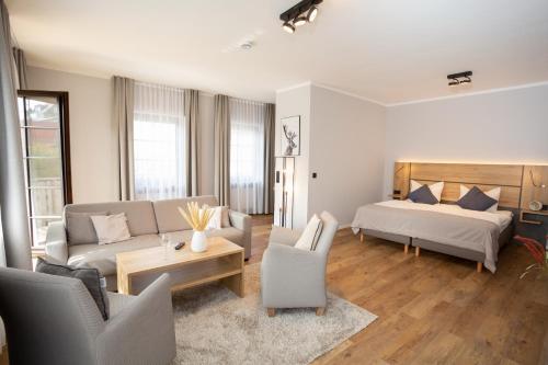 Ένα ή περισσότερα κρεβάτια σε δωμάτιο στο Chalet Bergzeit 5