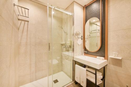 Um banheiro em Hotel Moon & Sun Braga