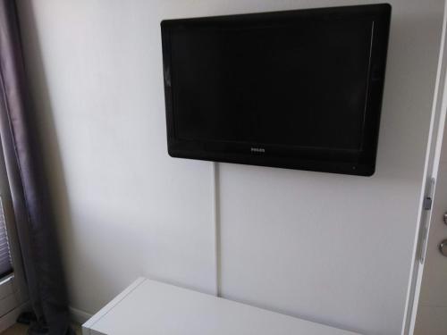 TV a/nebo společenská místnost v ubytování Meerchenhaus "Leuchtturm"