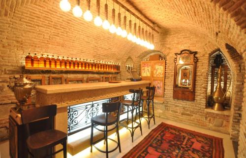 El salón o zona de bar de Vinotel Boutique Hotel