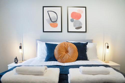 Ένα ή περισσότερα κρεβάτια σε δωμάτιο στο NEW! 3BR in James Street