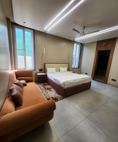 Postel nebo postele na pokoji v ubytování JK House