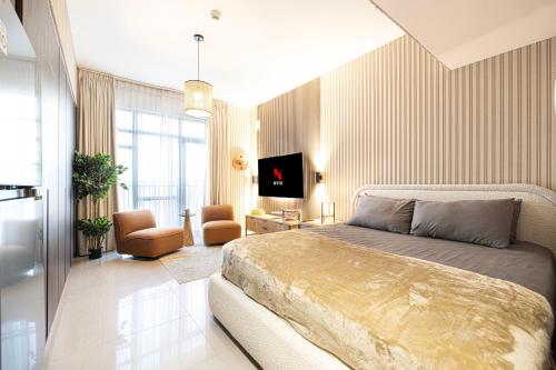 Katil atau katil-katil dalam bilik di Downtown Gem at Al Zahia by Blue Cloud