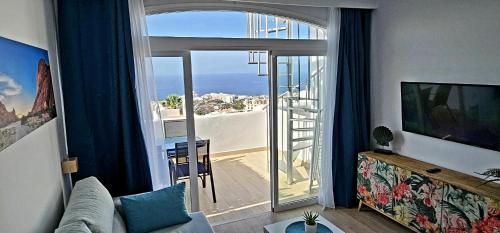 TV a/nebo společenská místnost v ubytování Ocean View Apartments