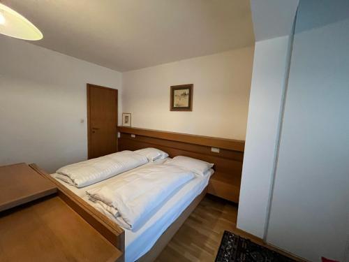 Posteľ alebo postele v izbe v ubytovaní Haus Schuschnig