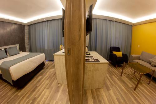 Postel nebo postele na pokoji v ubytování Baykara Hotel