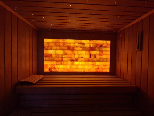 a sauna with a window in a brick wall at The Lake Hotel in Killarney