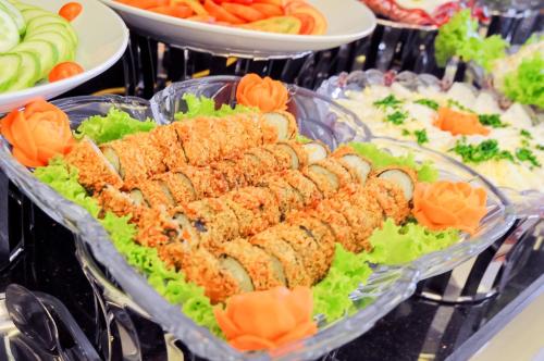 a platter of food on a buffet at May Ngu Sac - Iridescent Clouds Hotel in Nha Trang