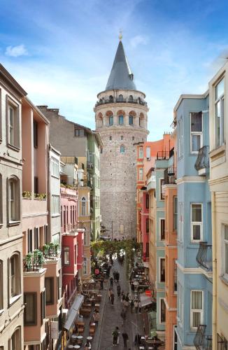 a view of a street in a city with a tower at Hotel Des Arts Galata in Istanbul