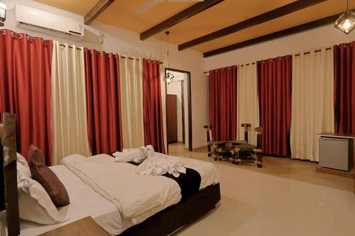 Fotografie z fotogalerie ubytování Nature's Sprout Wildmark Kanha Resort v destinaci Dhanwār