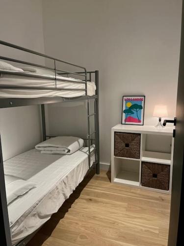 Ένα ή περισσότερα κρεβάτια σε δωμάτιο στο Appartement T3 - Face à la plage