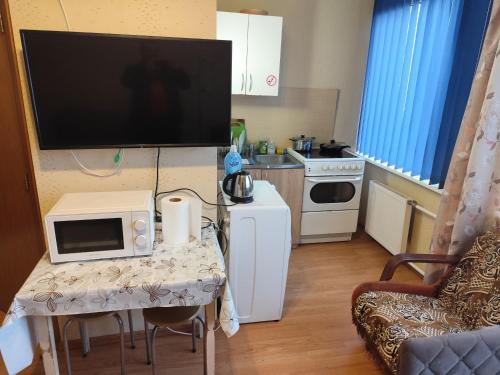 Η κουζίνα ή μικρή κουζίνα στο ITAJA apartment