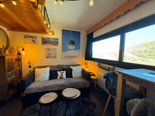 Postel nebo postele na pokoji v ubytování Les Menuires centre! Chaleureux studio sur les pistes!
