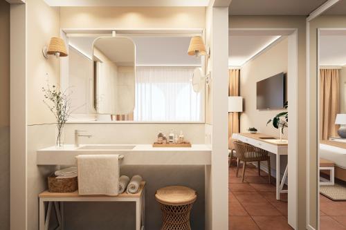 a bathroom with a sink and a mirror at Bordoy Don Antonio in Paguera