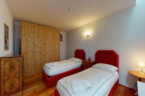 Apartment Sur Puoz 1Aにあるベッド