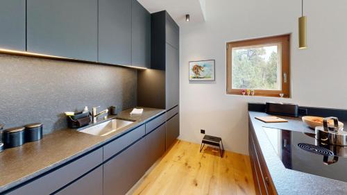 Kuchyň nebo kuchyňský kout v ubytování Apartment Margnetta