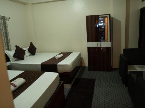 Hotel DARPAN PALACEにあるベッド
