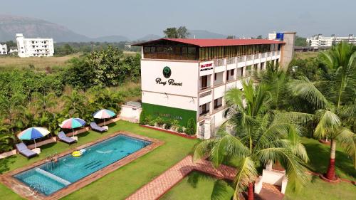 an aerial view of a hotel with a swimming pool at Raaj Resort in Panvel