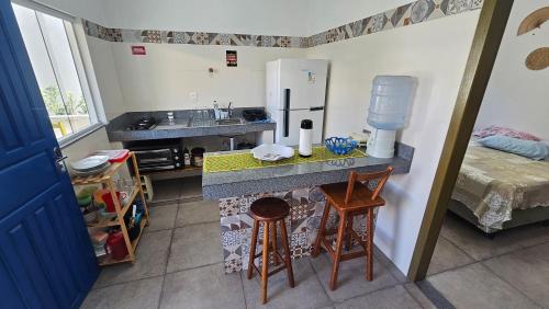 Dapur atau dapur kecil di Vila Axé Flat Lua 2