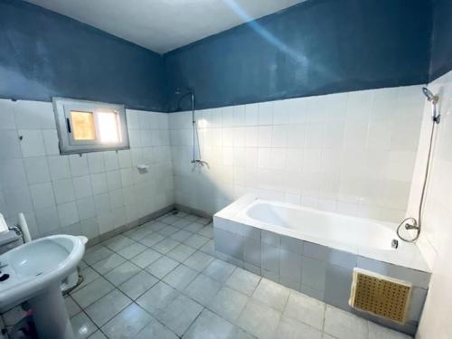 Et badeværelse på Appartement meublé